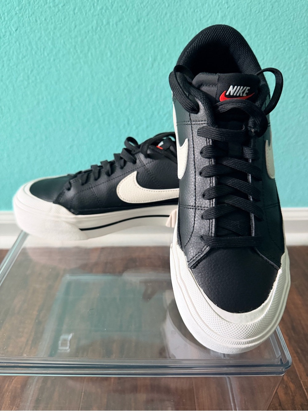 Nike Black Leather Low-Top Sneakers with White Swoosh